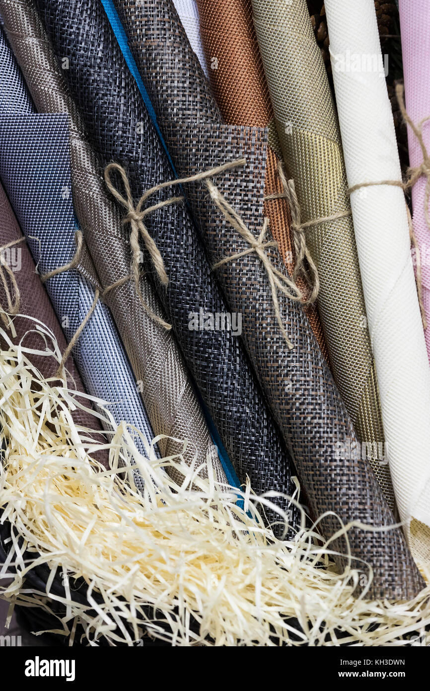 Rolls of wrapping paper binding with rope Stock Photo Alamy