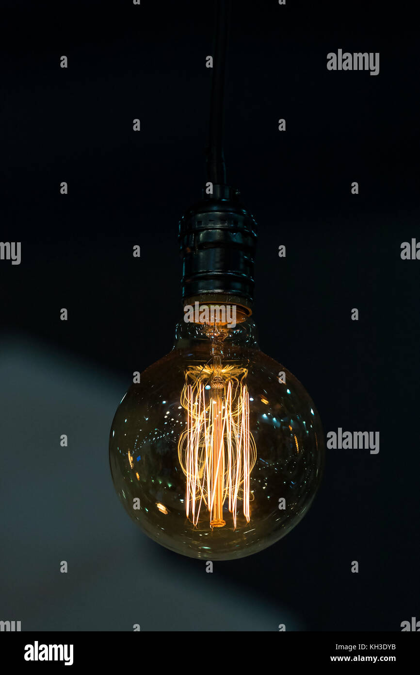 Ampoule of electric lamp on a dark background Stock Photo Alamy