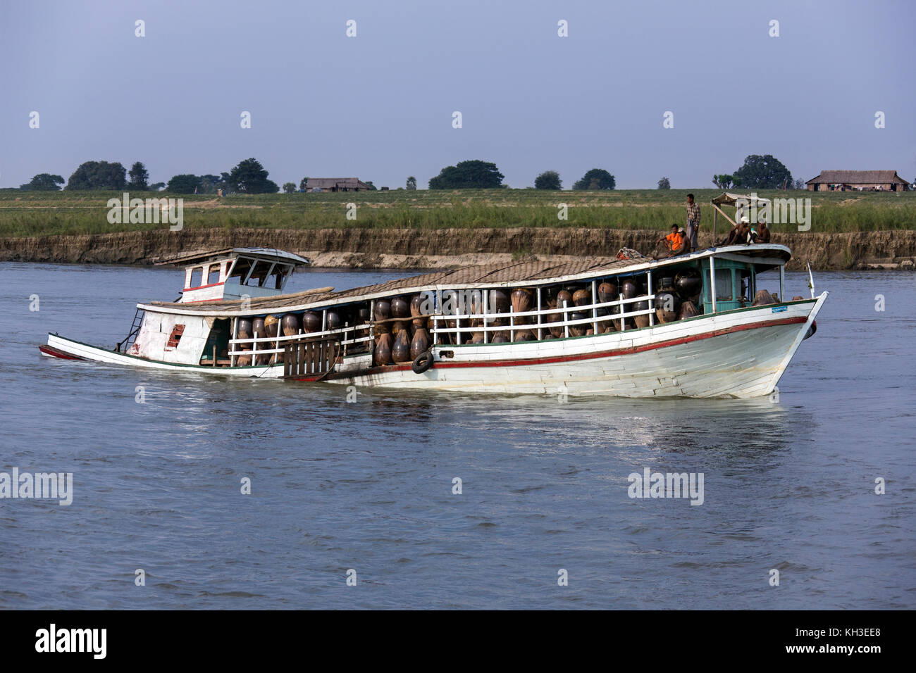 Overloaded boat on the Irrawaddy River (Ayeyarwaddy River) in Myanmar (Burma). It is the country