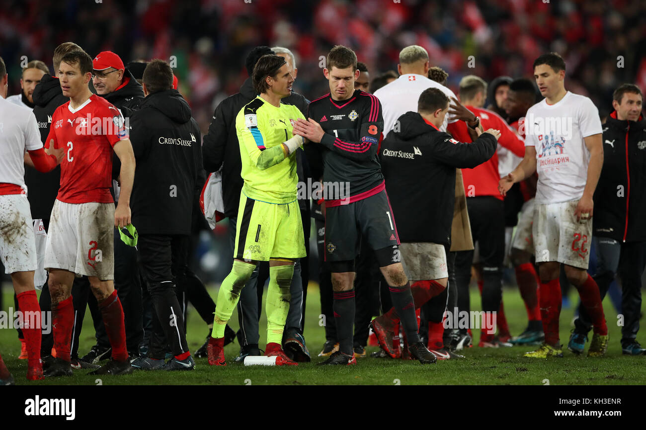 Switzerland goalkeeper Yann Sommer (left) shakes hands with Northern Ireland goalkeeper Michael McGovern after the FIFA World Cup Qualifying second leg match at St Jakob Park, Basel. Stock Photo