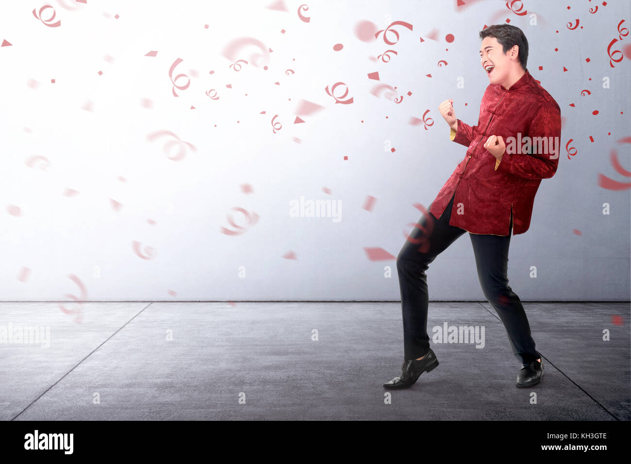 Young chinese man in cheongsam suit. Happy Chinese New Year Stock Photo