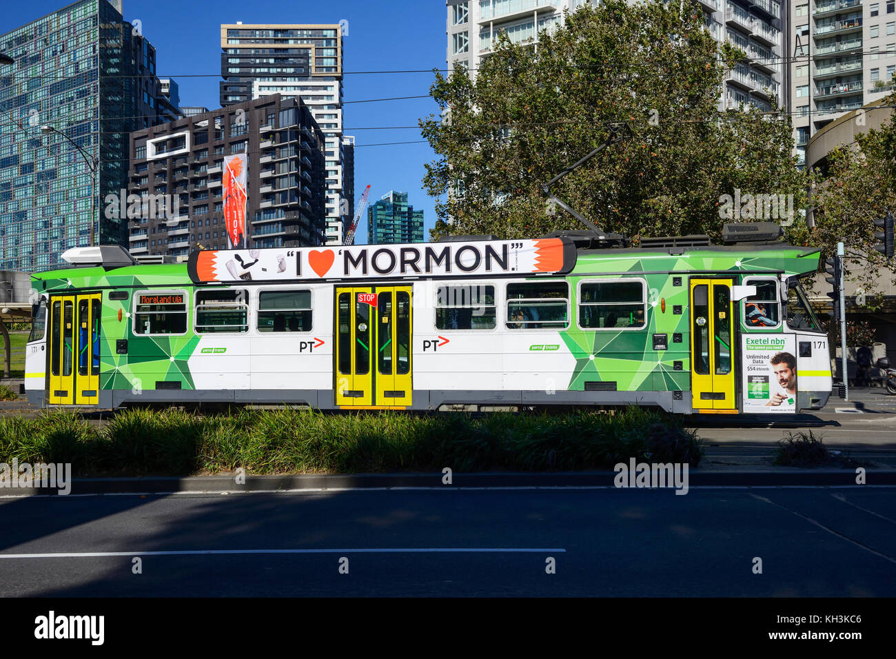 Green and white liveried tram within the Central Business District of Melbourne, Victoria, Australia Stock Photo