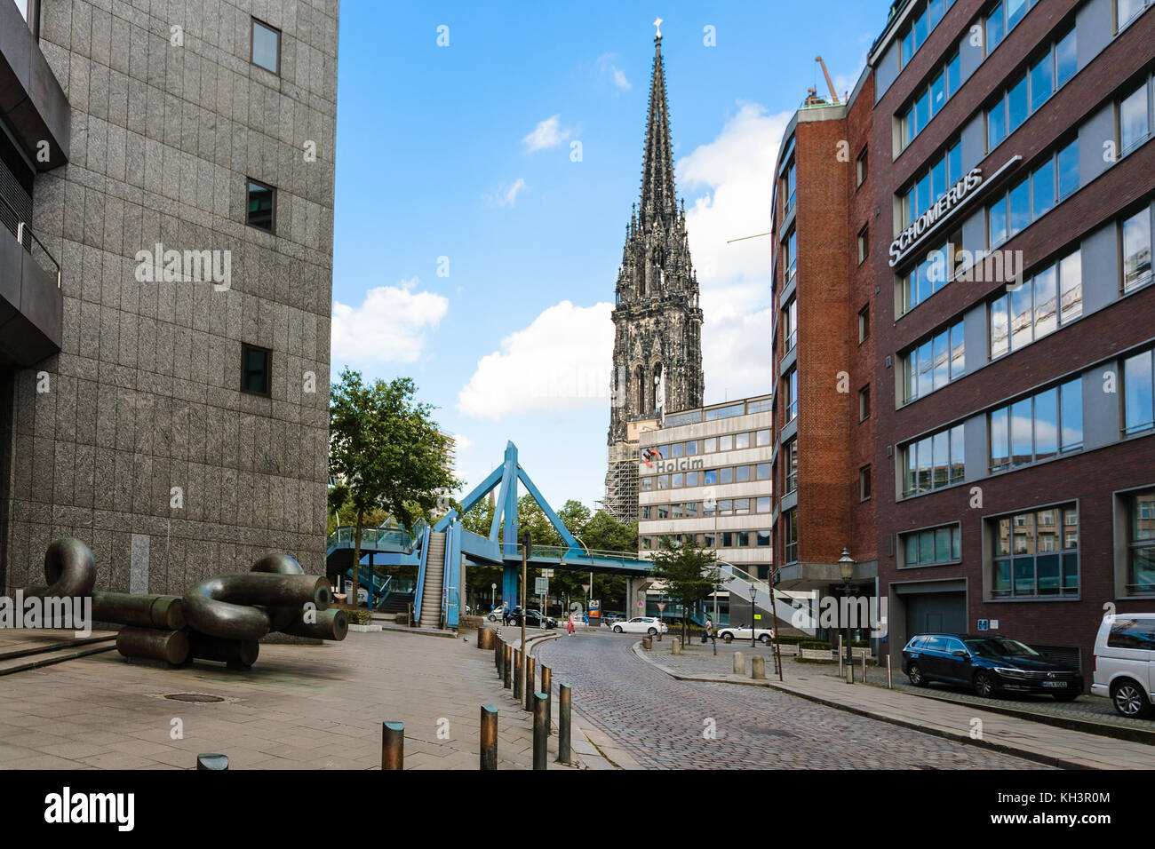 HAMBURG, GERMANY - SEPTEMBER 15, 2017: Deichstrasse street and view of St Nicholas church. The church was the tallest building in the world in 1874-18 Stock Photo