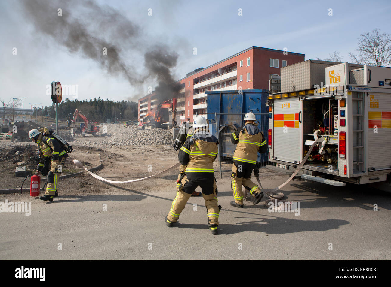 Rescue personnel at a fire, Rinkeby, Sweden. Stock Photo