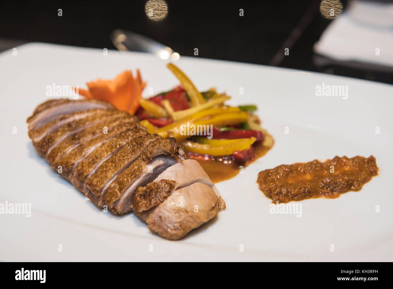 Beef steak a la carte Chinese meal with curry sauce and vegetables on