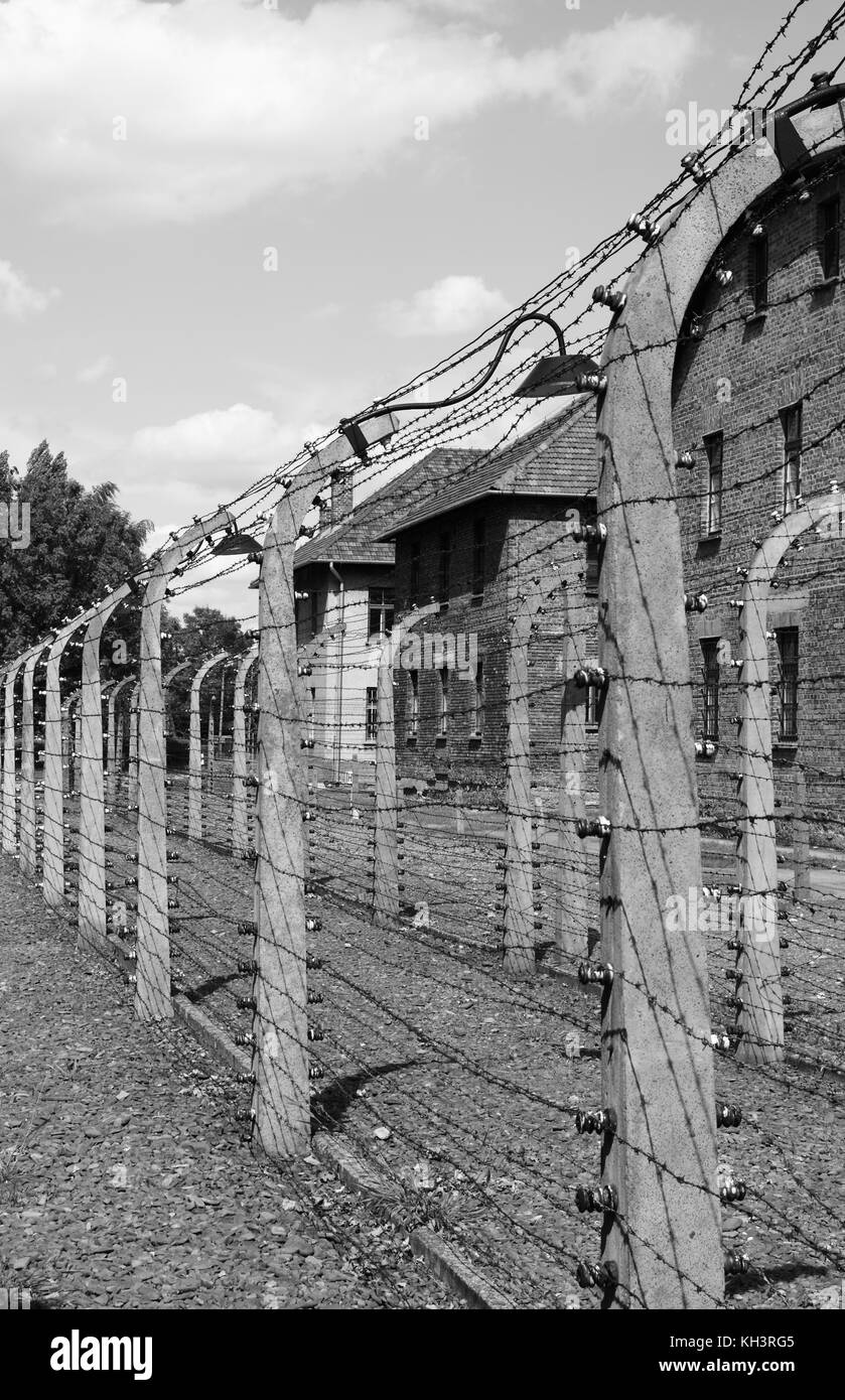 Barbed wire electrical fence at Auschwitz concentration camp, Poland Stock Photo