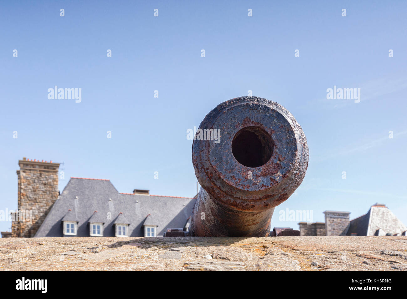 Cannon peeping over the ramparts at Saint Malo, Brittany, France. Stock Photo