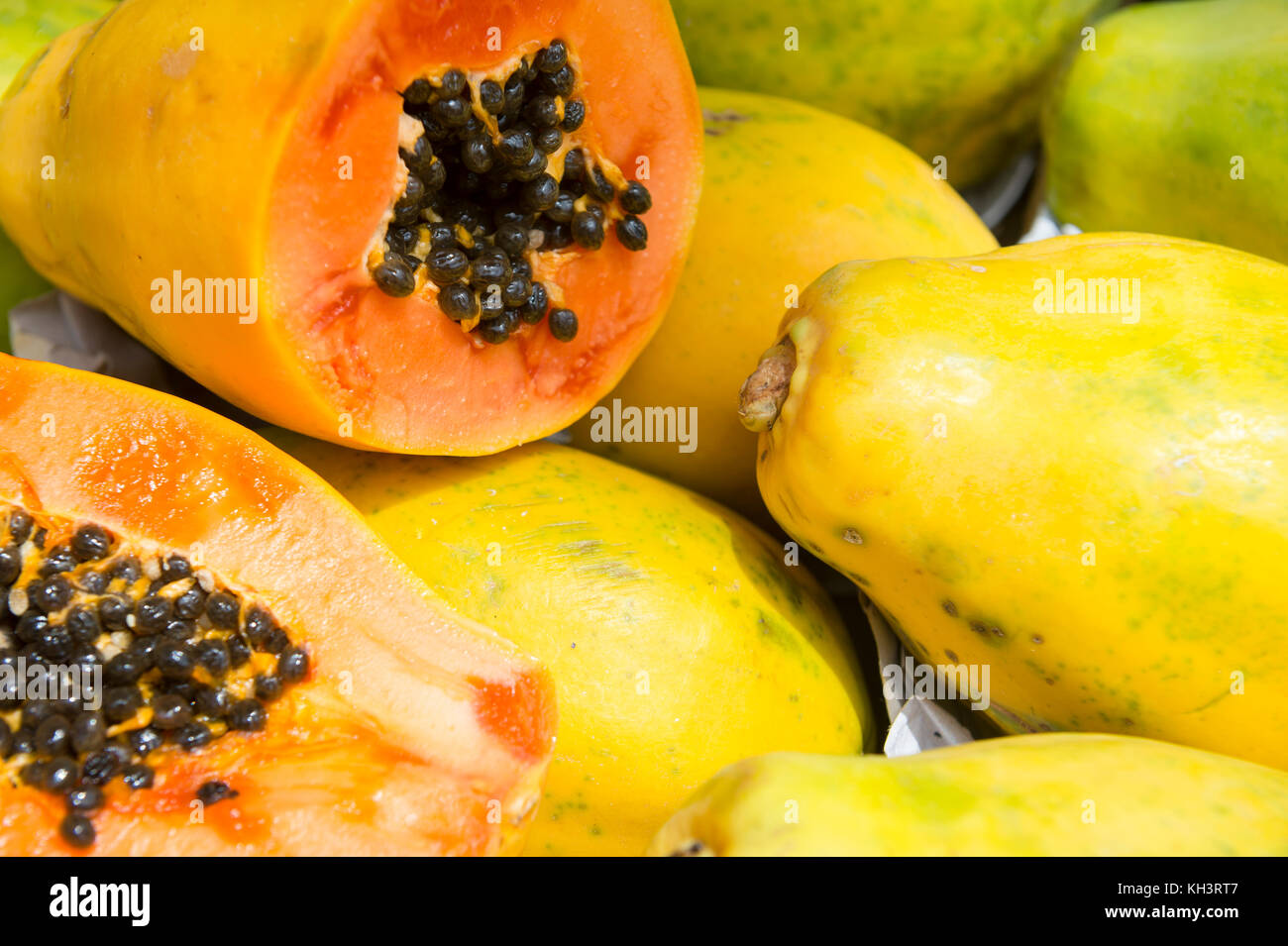 Fresh cut juicy tropical papaya mamao fruit with seeds at Brazilian