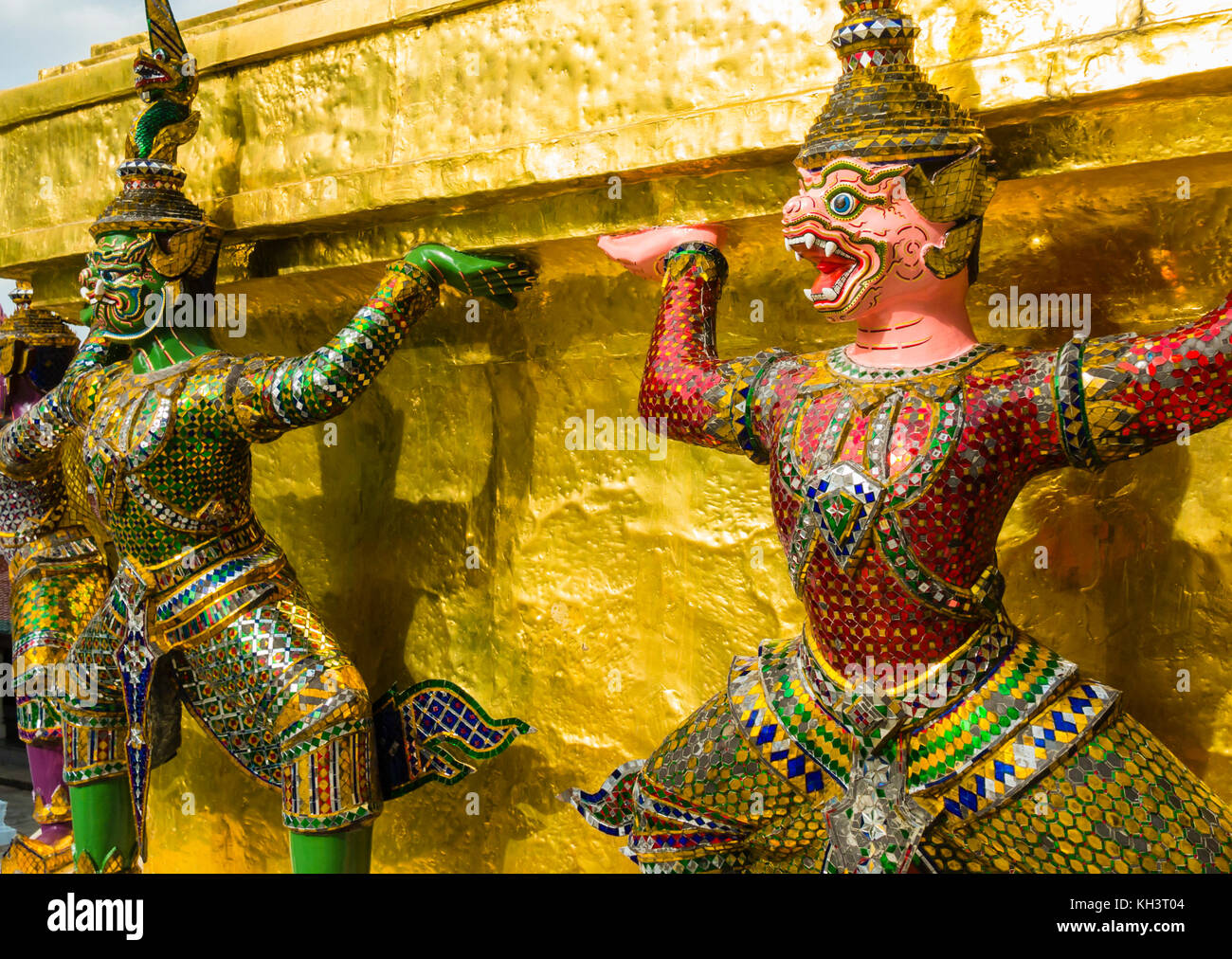 Perspective view of demon guardians supporting Wat Arun Temple, Bangkok, Thailand Stock Photo