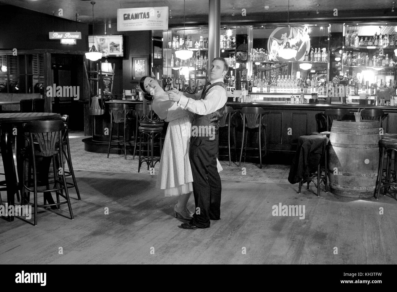 Couple dancing in a bar location Stock Photo