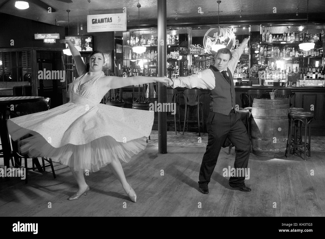 Couple dancing in a bar location Stock Photo