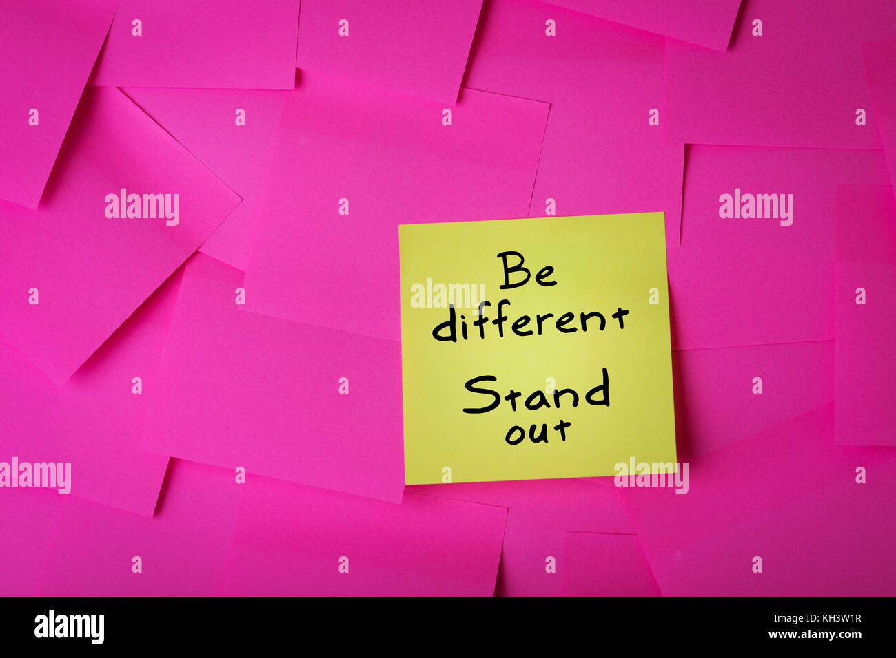 be different stand out text on yellow sticky note Stock Photo