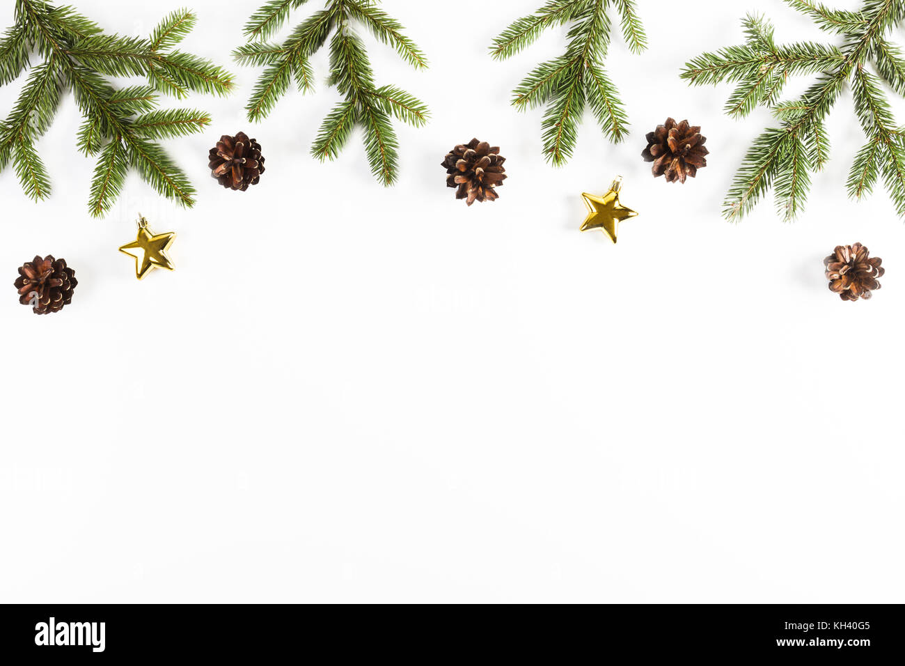 Christmas background with fir branches, pine cones and Xmas decorations ...