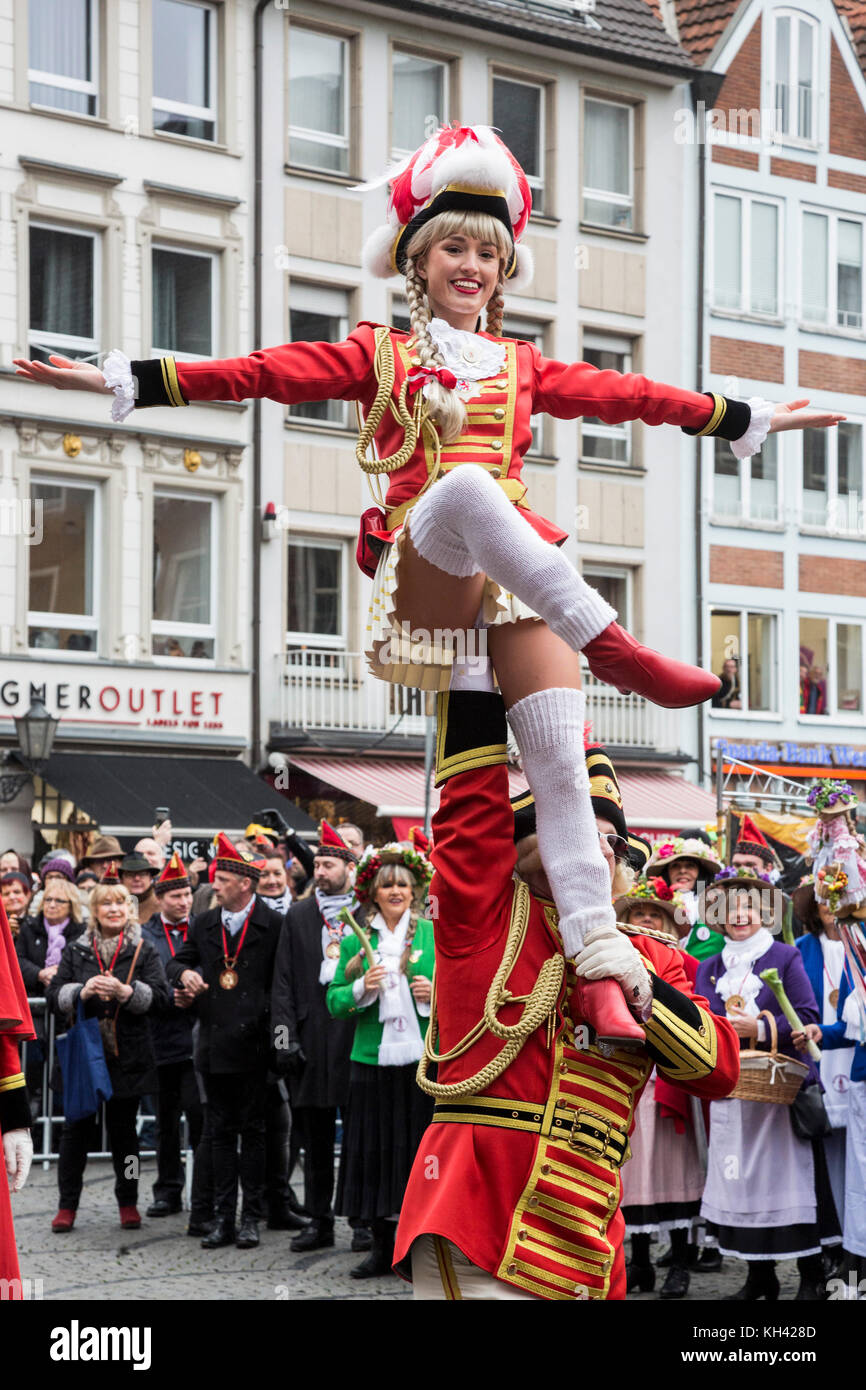 The German Carnival season traditionally begins with the Hoppeditz Erwachen event on 11 November, Düsseldorf, Germany, and runs to Ash Wednesday the following year. Traditional Tanzmariechen, majorette dancers. Stock Photo