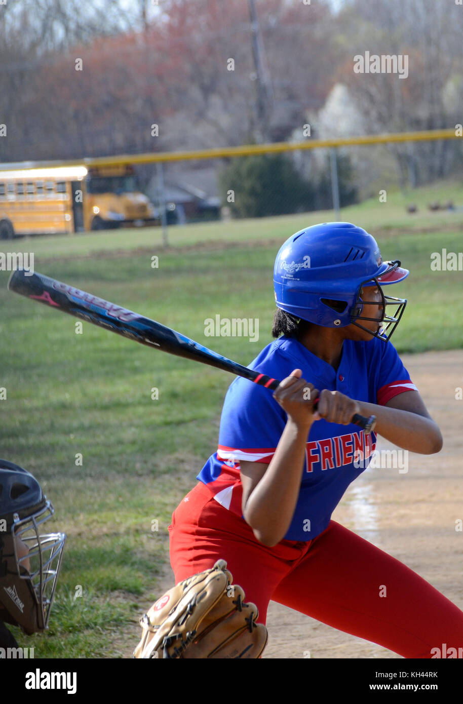 Batter in a high school softball game Stock Photo Alamy