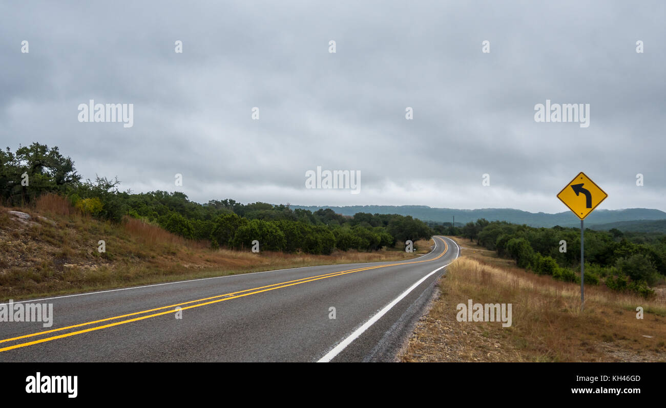 Wide Angle View of Road Curving Left In the Distance Stock Photo
