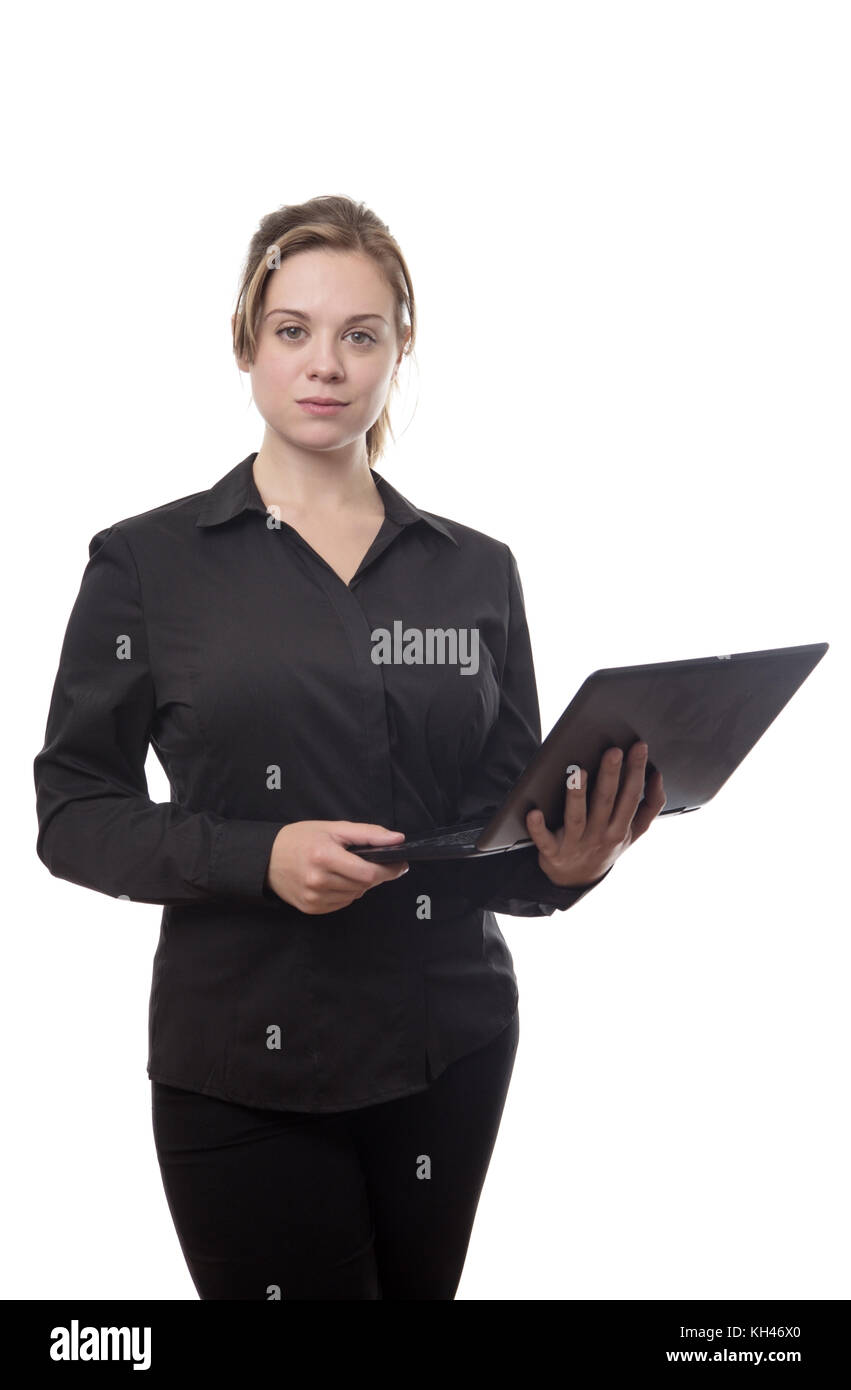 standing young business woman working on a computer Stock Photo - Alamy