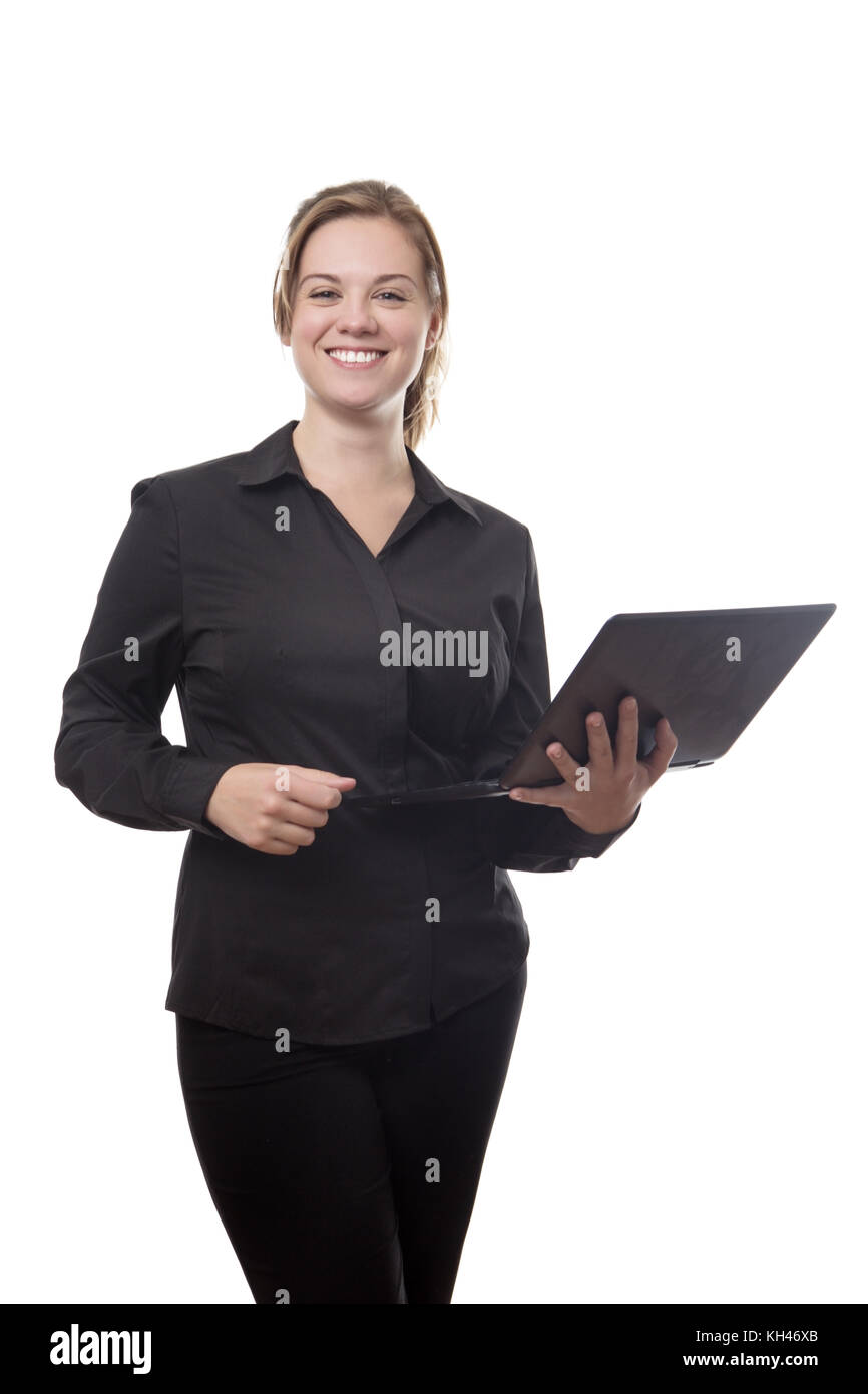 standing young business woman working on a computer Stock Photo - Alamy