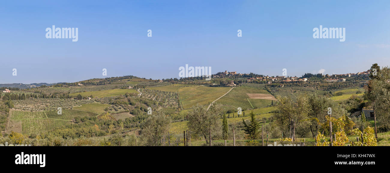 View to town Castellina in Chianti with hills with vineyards in Tuscany in Italy Stock Photo