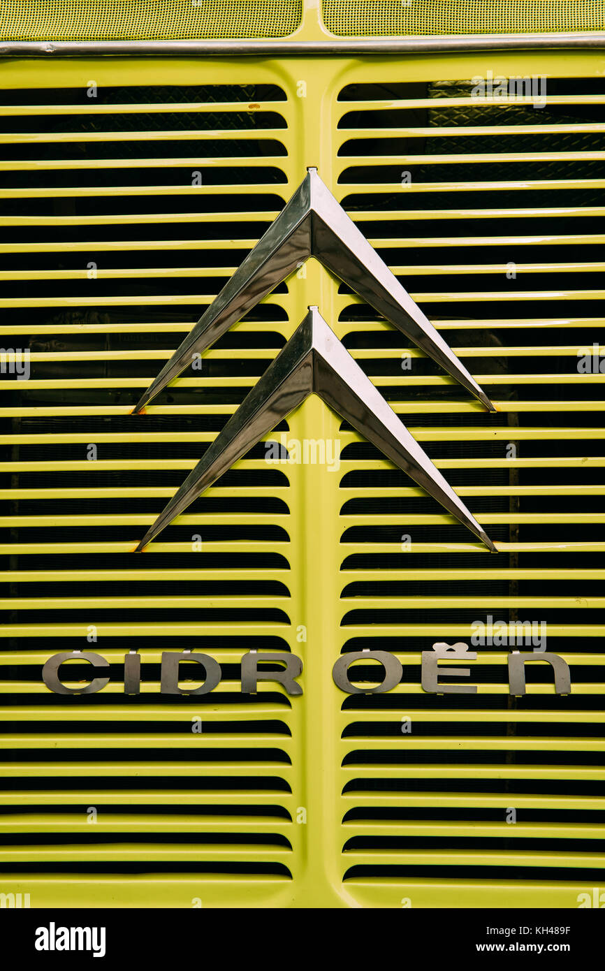 Prague, Czech Republic - September 23, 2017: Close View Of Old Logo Logotype Sign Of Citroen On Hood Of Old Retro Vintage Yellow Car. Stock Photo