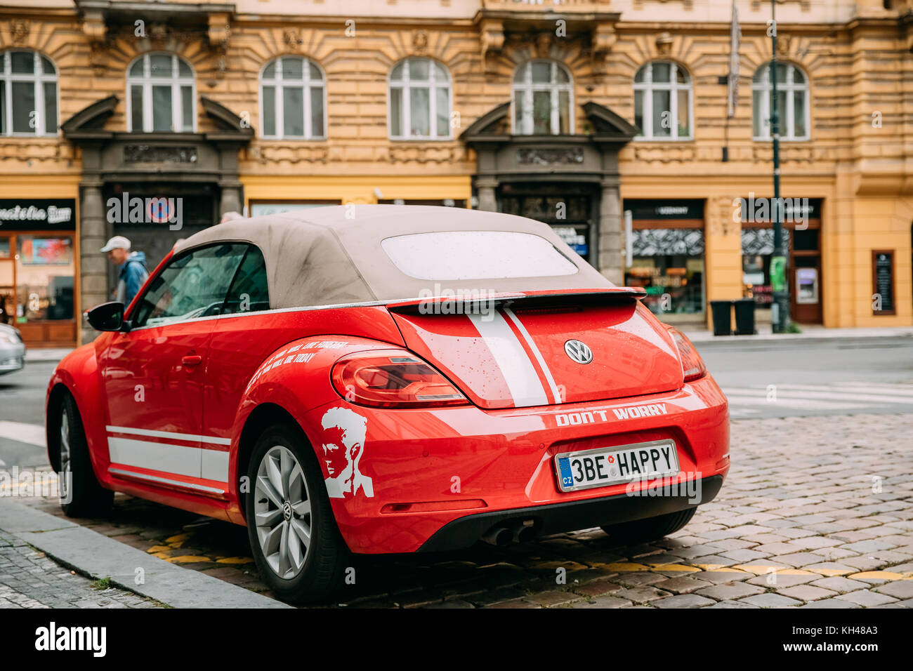 Prague, Czech Republic - September 24, 2017: Back View Of Red Volkswagen New Beetle Cabriolet Car Parked In Street. Stock Photo