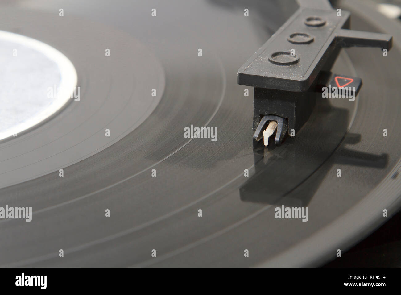 turntable with stylus running along a vinyl record Stock Photo Alamy