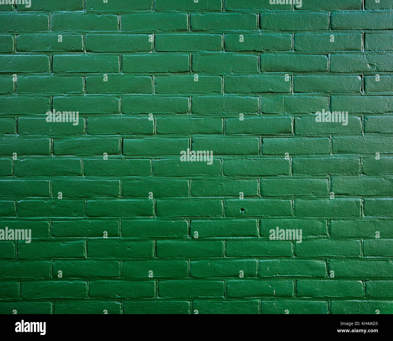 part of dark green painted brick wall Stock Photo - Alamy