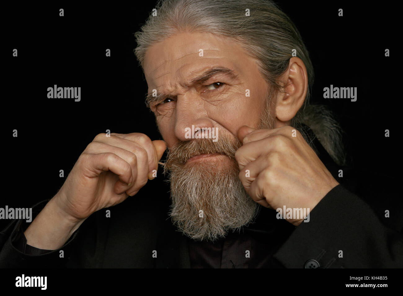 Close up portrait of aged grey haired man. Stock Photo