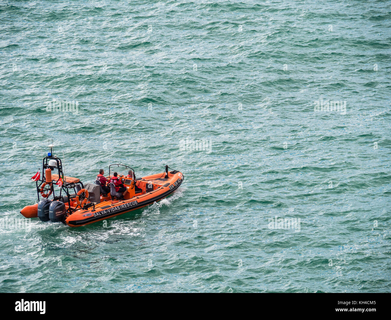 Carvoeiro , Portugal - October 20, 2017: Rescue boat patrols near Carvoeiro on the southern Atlantic coast of Portugal. Stock Photo