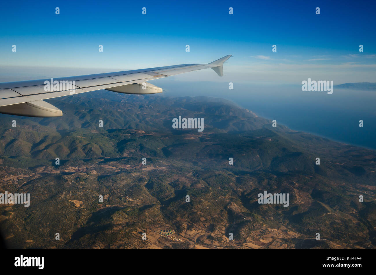 Amazing view from the plane window at the sky.Flight over the aegean sea. Stock Photo