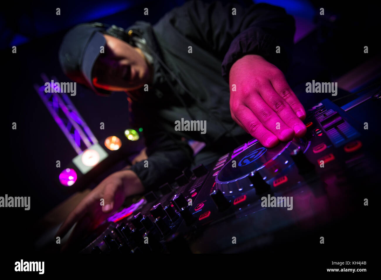 Disc jockey at the turntable dj plays on the best famous cd players at