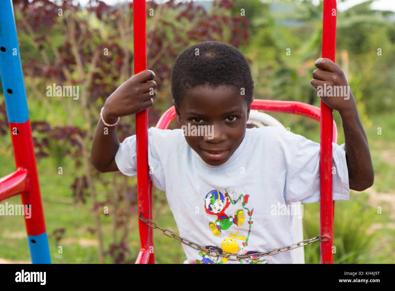 A tween age smiling Ugandan girl. Stock Photo