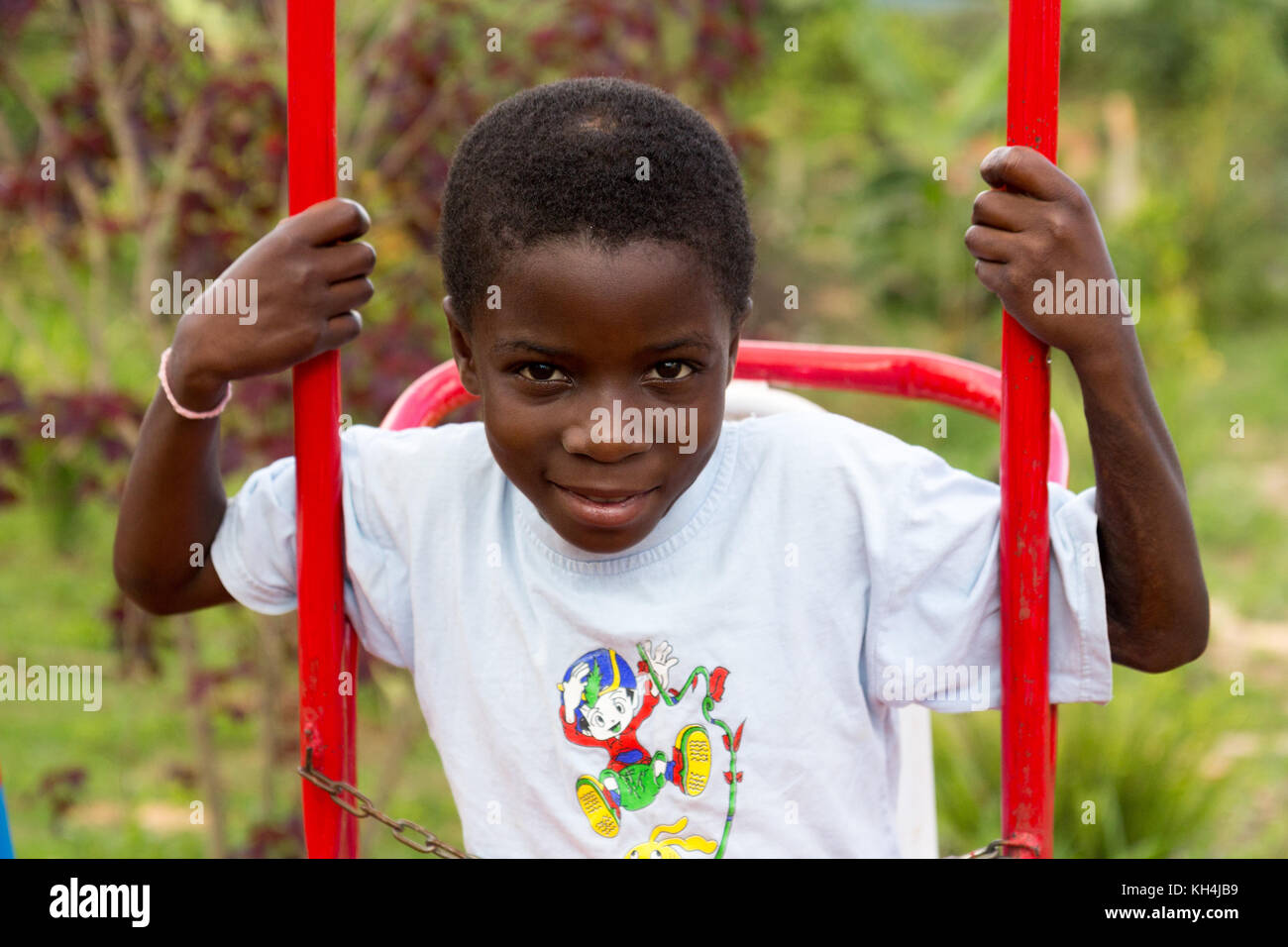 A tween age smiling Ugandan girl. Stock Photo