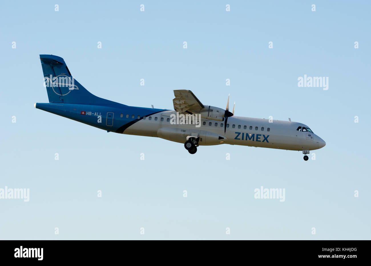 Zimex Aviation ATR72 landing at Birmingham Airport, UK (HB-ALL) Stock Photo