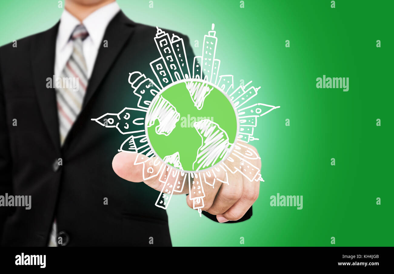 Businessman pointing on doodle globe with buildings. Eco-friendly business, Green business, environmental reservation and sustainable business concept Stock Photo