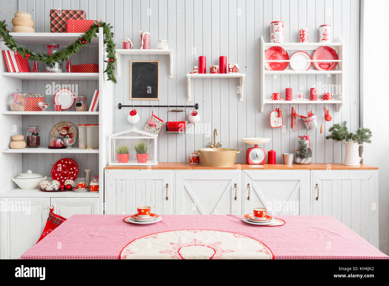 Interior Light Grey Kitchen And Red Christmas Decor Preparing