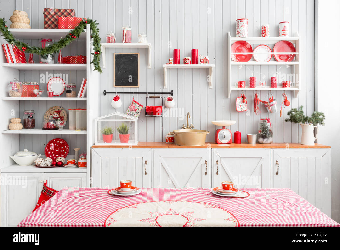 Interior Light Grey Kitchen And Red Christmas Decor Preparing Lunch At Home On The Kitchen Concept Stock Photo Alamy