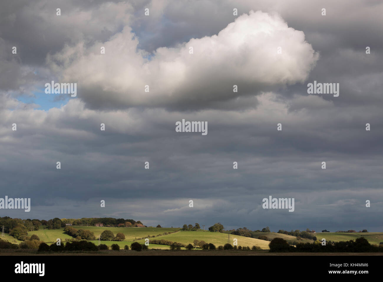 Cloudy sky over Kent countryside on the way to Romney Marsh Stock Photo