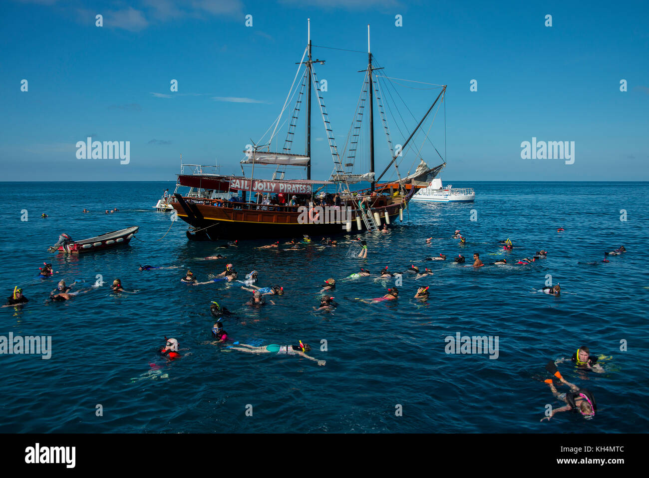 Caribbean, Leeward Islands, Aruba (part of the ABC Islands), Oranjestad. Tourists snorkeling off the Jolly Pirates boat around the Antilla shipwreck,  Stock Photo