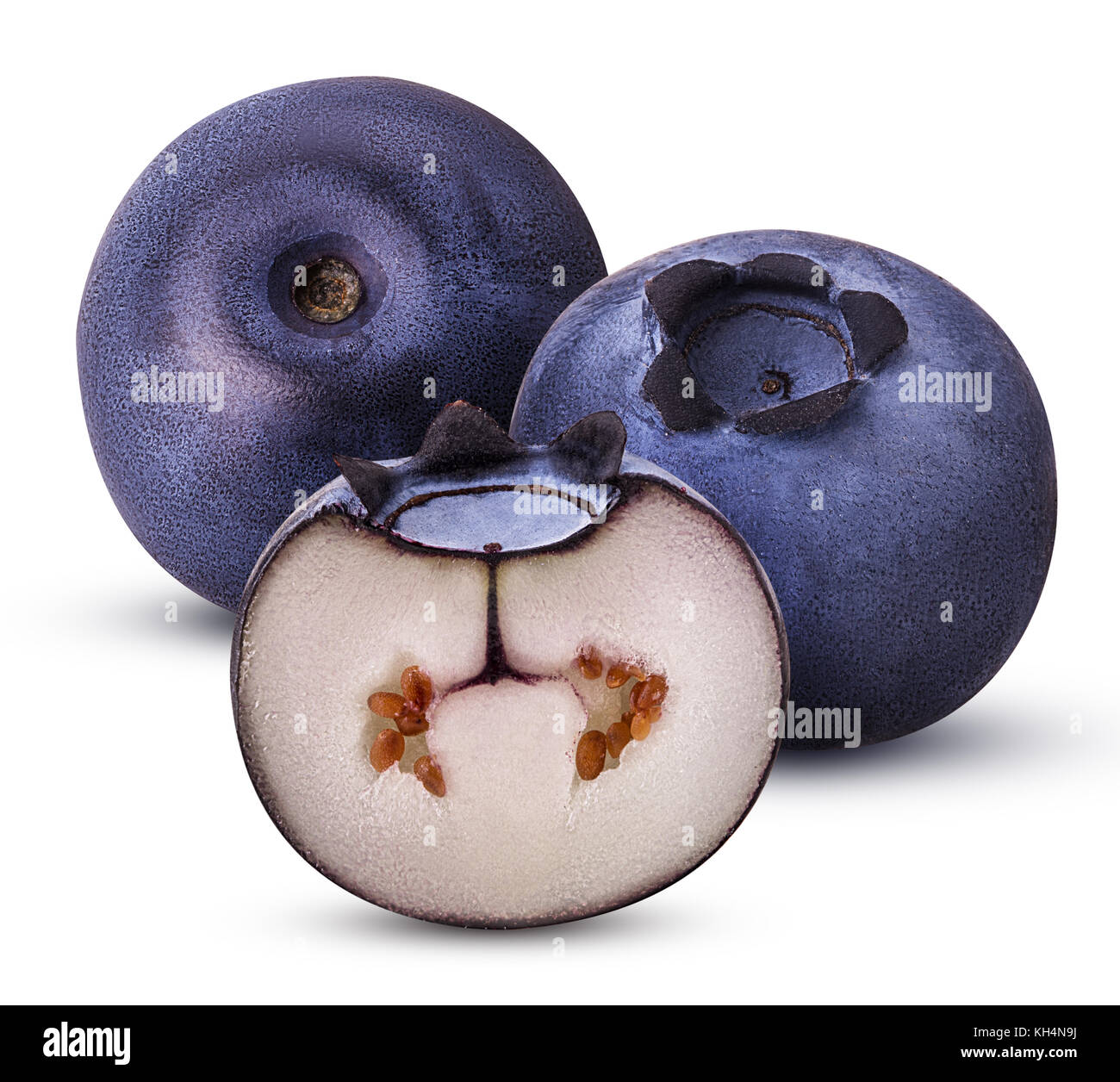 Two Ripe blueberry one cut in half isolated on white background