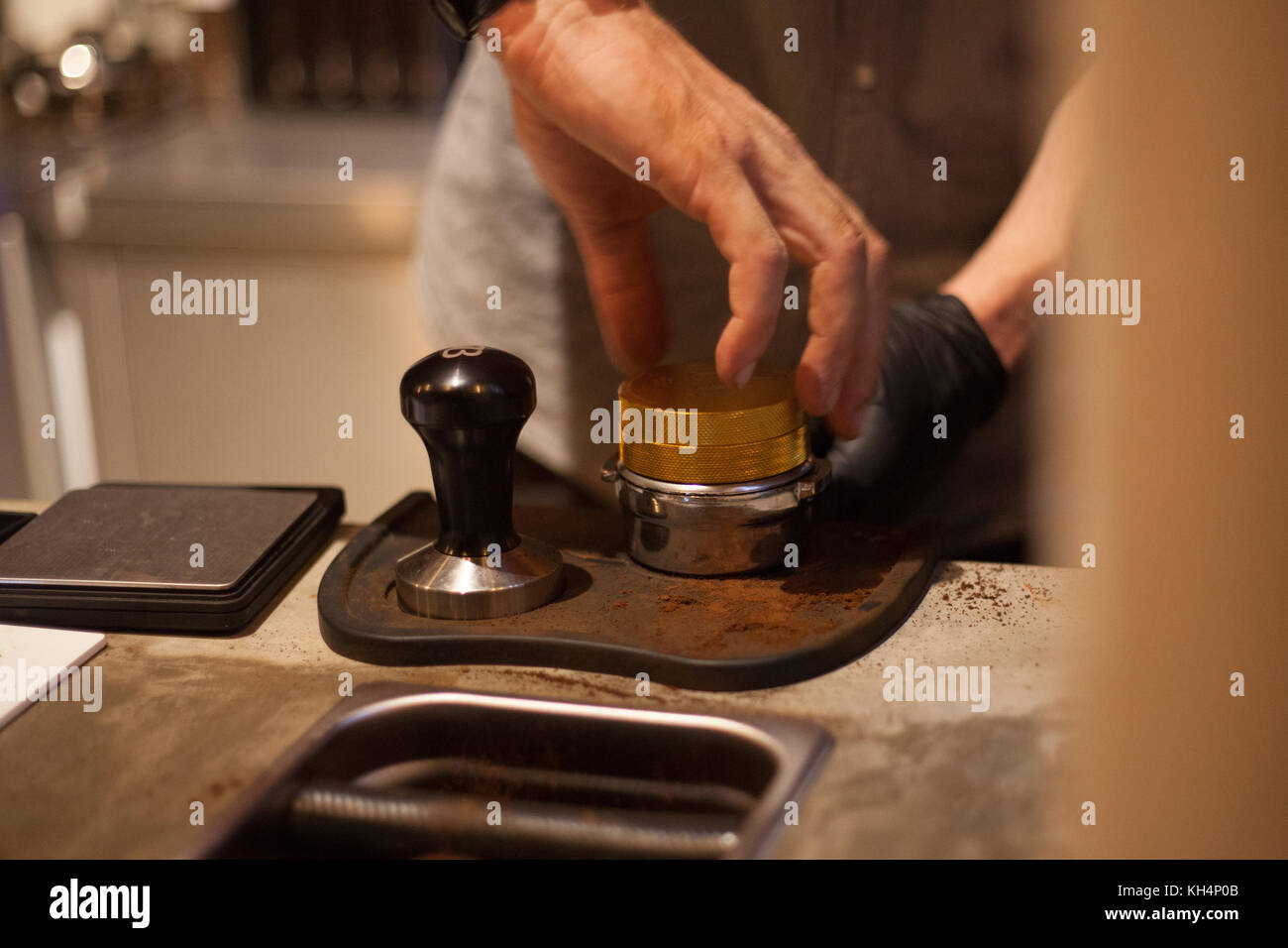 Tamping Espresso Shot with Hand by Barista Stock Photo Alamy