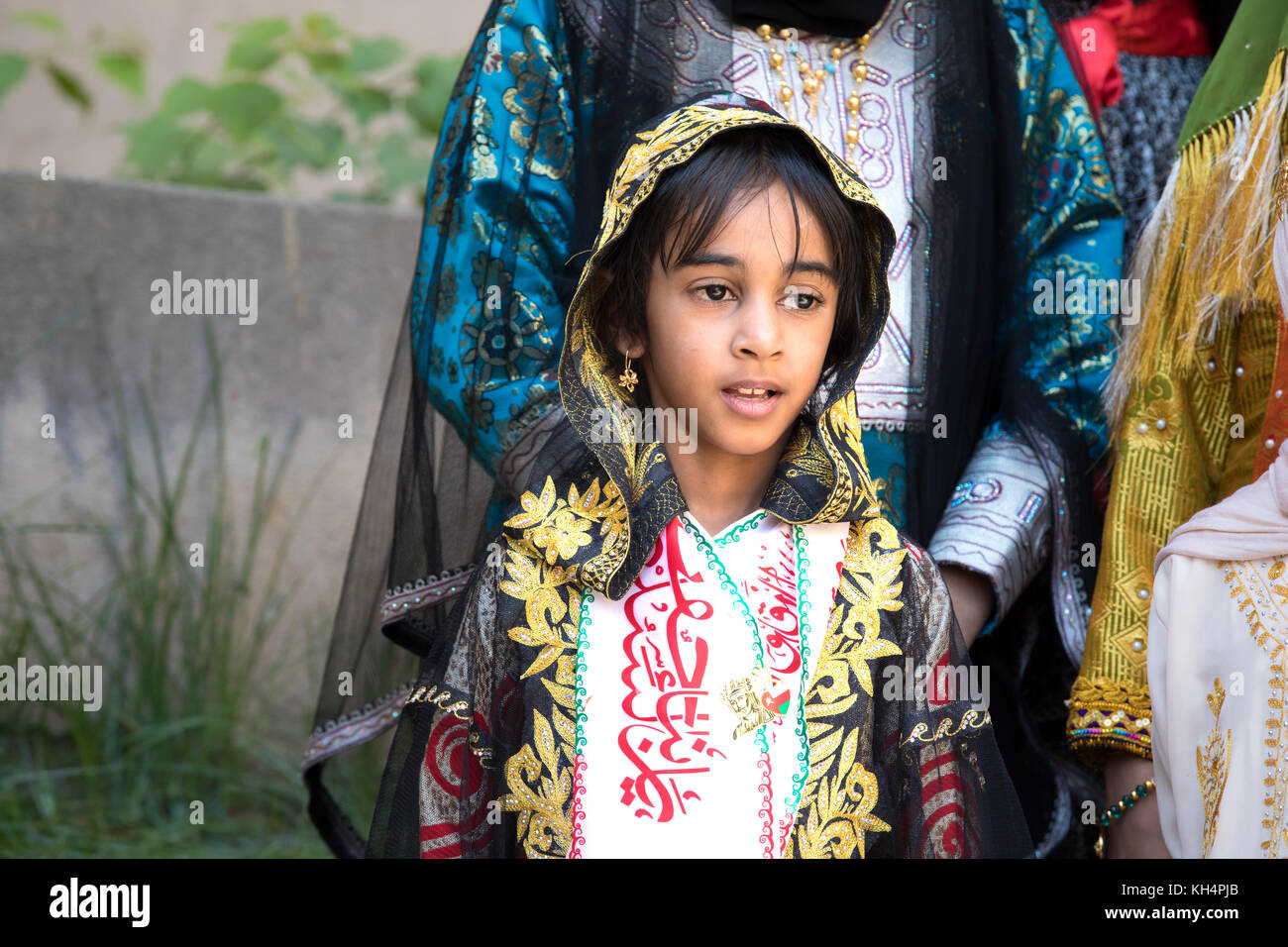 Portrait of a young Omani girl in the traditional Omani outfit. Nizwa, Oman. Stock Photo