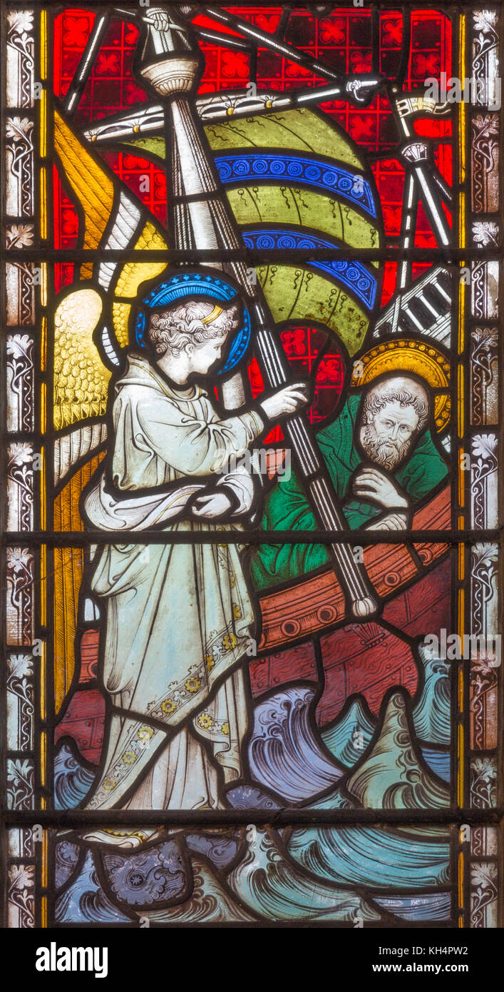 LONDON, GREAT BRITAIN - SEPTEMBER 19, 2017: The St. Paul and the angel at the strom on the sea on the stained glass in St Mary Abbot's church Stock Photo