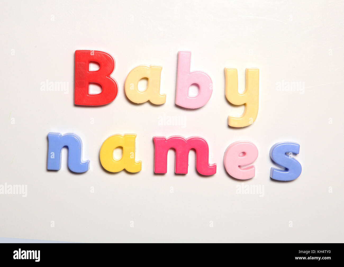 baby names spelt in magnet letters Stock Photo