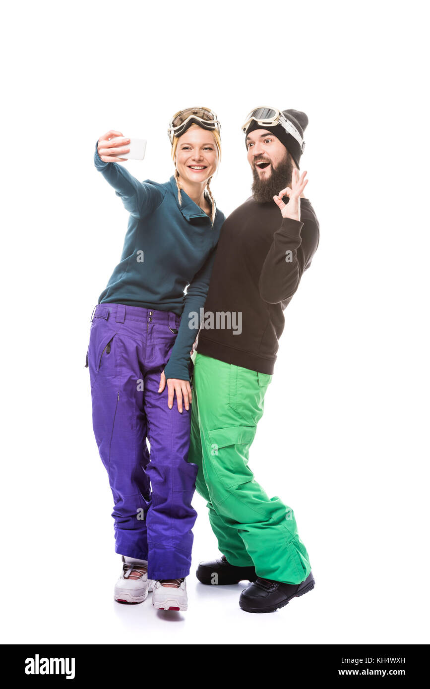snowboarders taking selfie Stock Photo