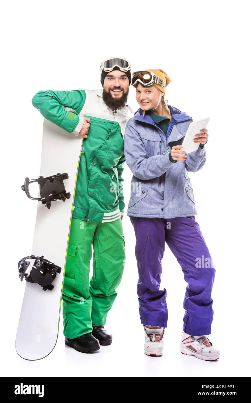 couple of snowboarders with tablet Stock Photo