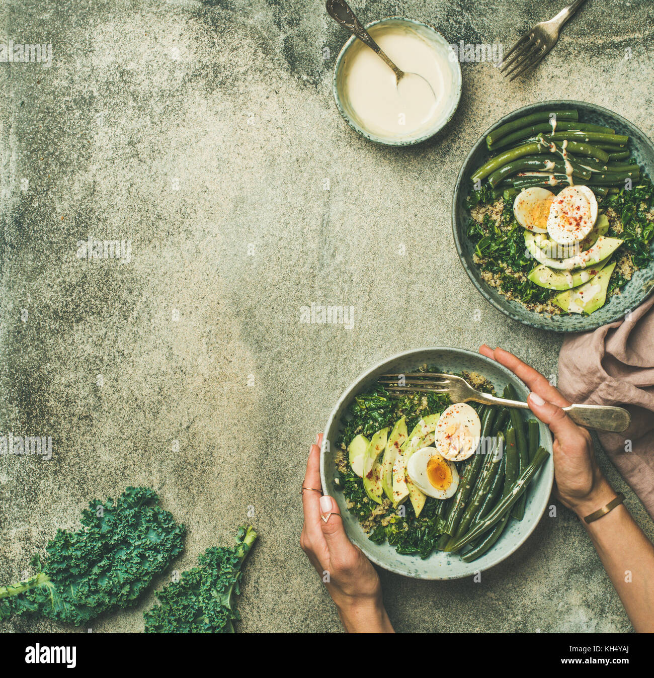 Quinoa, kale, beans, avocado, egg bowls, copy space Stock Photo Alamy
