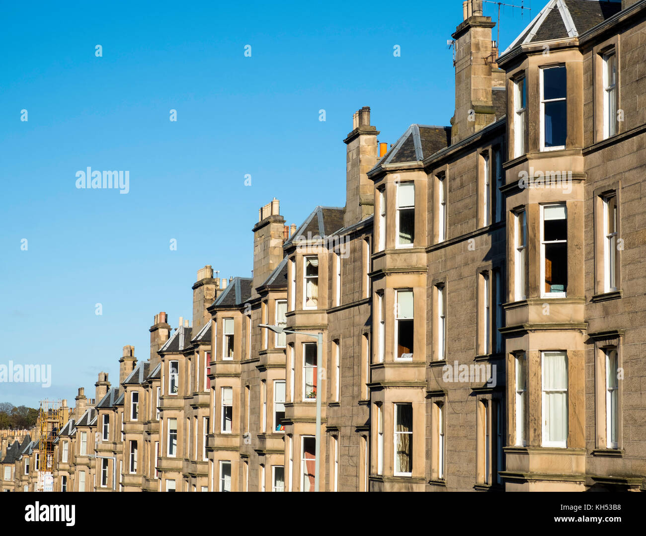 Detail of row of sandstone terraced apartments (tenements) on Comely Bank Avenue in Edinburgh, Scotland, United Kingdom Stock Photo