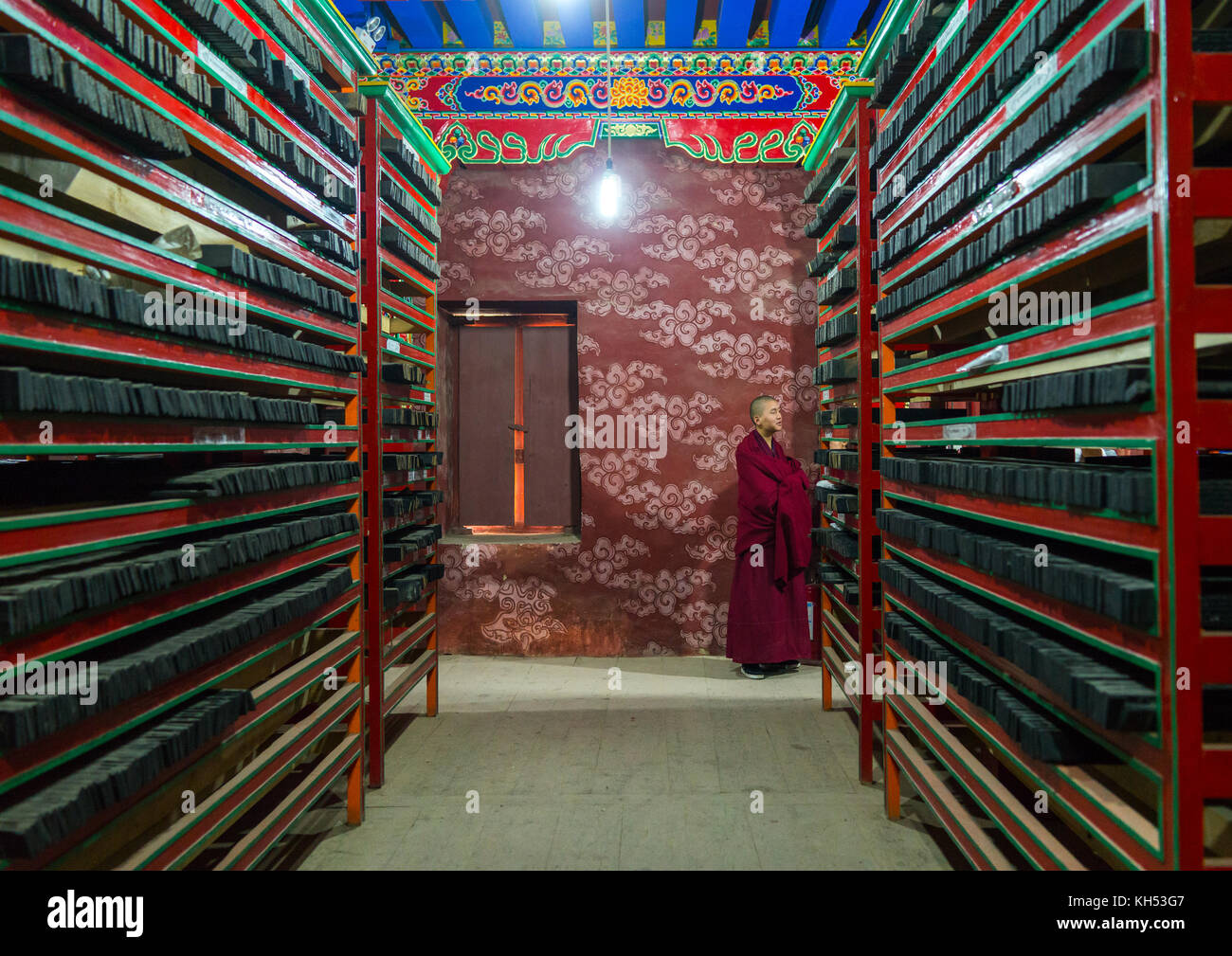 Tibetan scriptures printed from wooden blocks in Barkhang library, Gansu province, Labrang, China Stock Photo