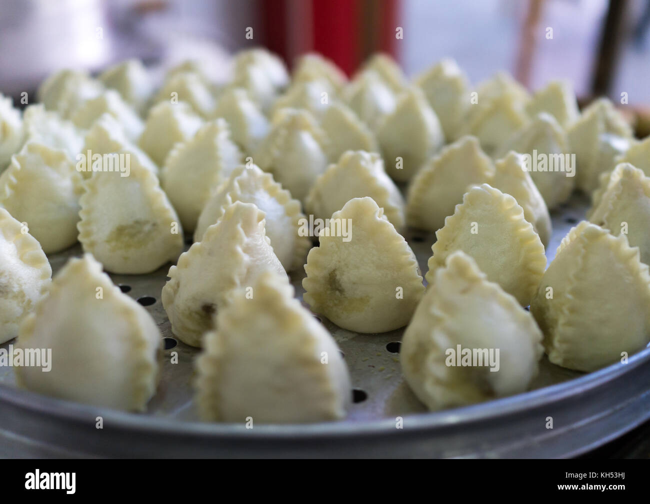 Typical street food dumplings called momos, Gansu province, Linxia, China Stock Photo